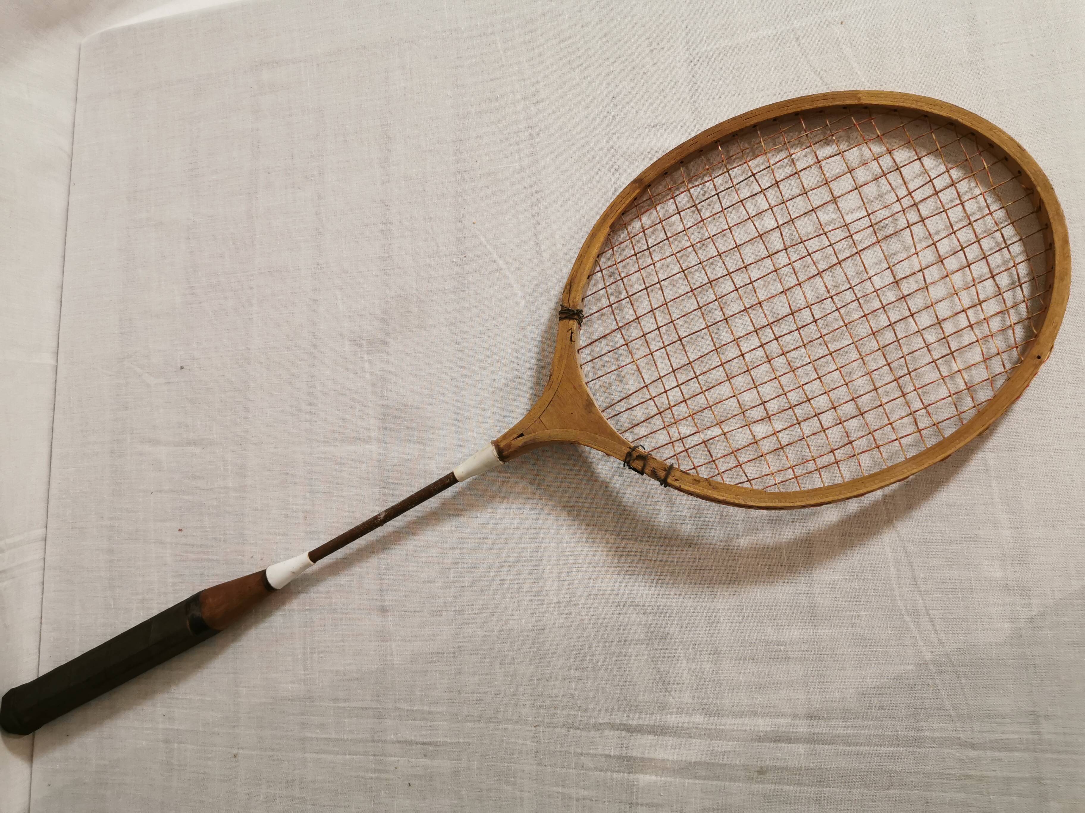 Old tennis racket early 20th in wood