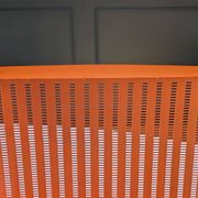 Vintage metal magazine rack in perforated orange/Mathieu Mategot style/70s
