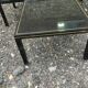 Vintage metal coffee table with glass top.