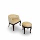 An antique Italian bar chair and a matching tufted vanity stool.