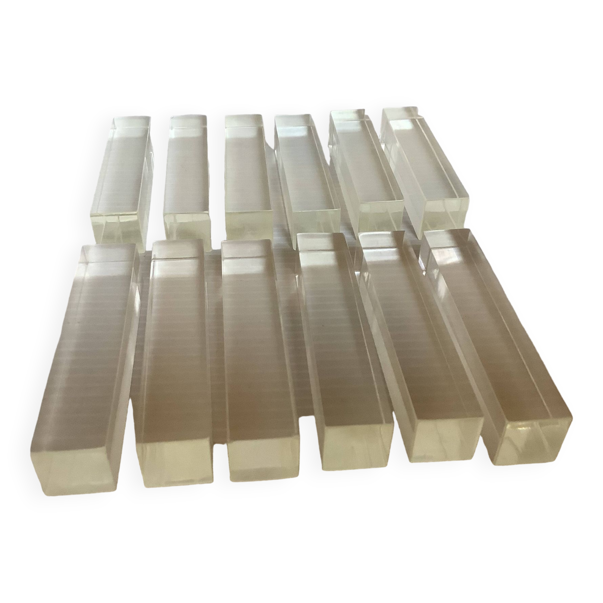 Twelve old lucite knife holders