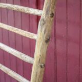 Old vintage wooden animal barrier, wall espalier, plant holder