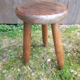 Old vintage wooden tripod milking stool