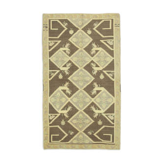 1970s handwoven distressed anatolian beige carpet 140 cm x 250 cm