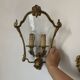 Wall lamp in Louis XV style in brass, shell decoration.