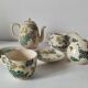 Japanese-style tea set in cracked earthenware with chrysanthemum flowers
