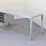 Brushed aluminum desk by MDF Italia