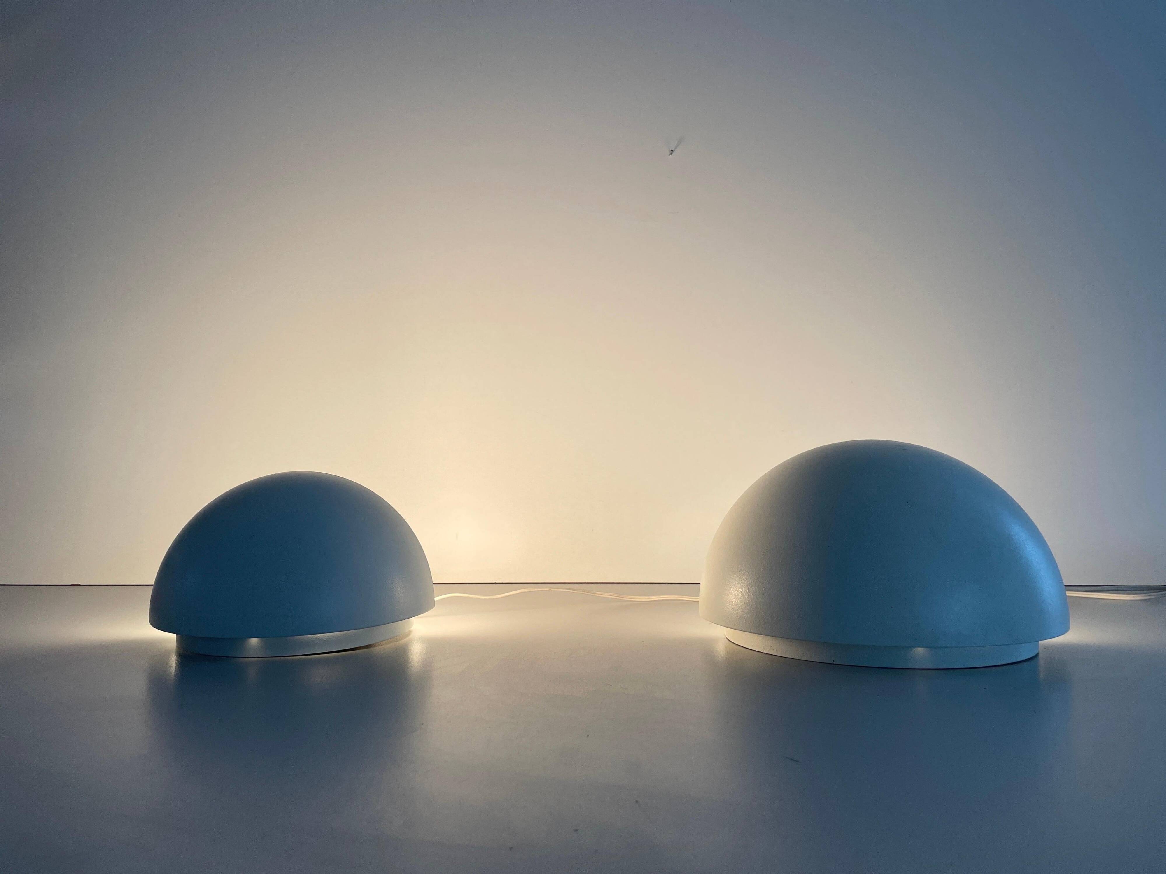 Round wall lights, small and large, in white metal by Bega, 1970s, Germany.