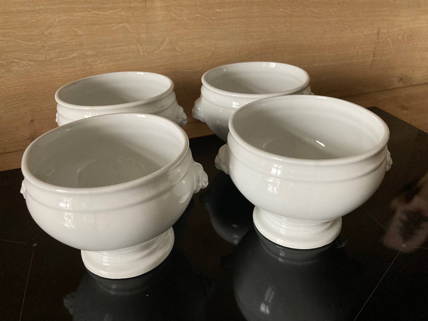 Set of 4 white porcelain lion head tureens