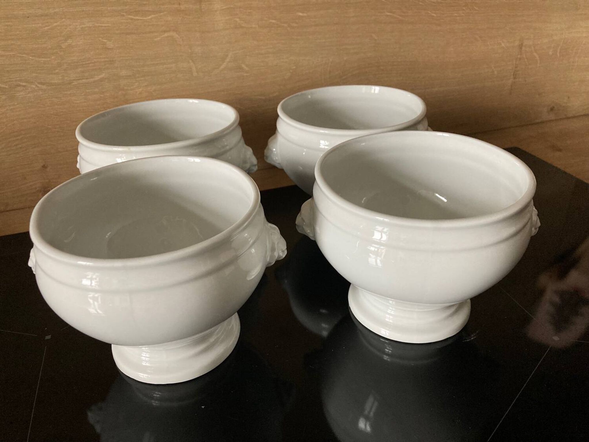 Set of 4 white porcelain lion head tureens