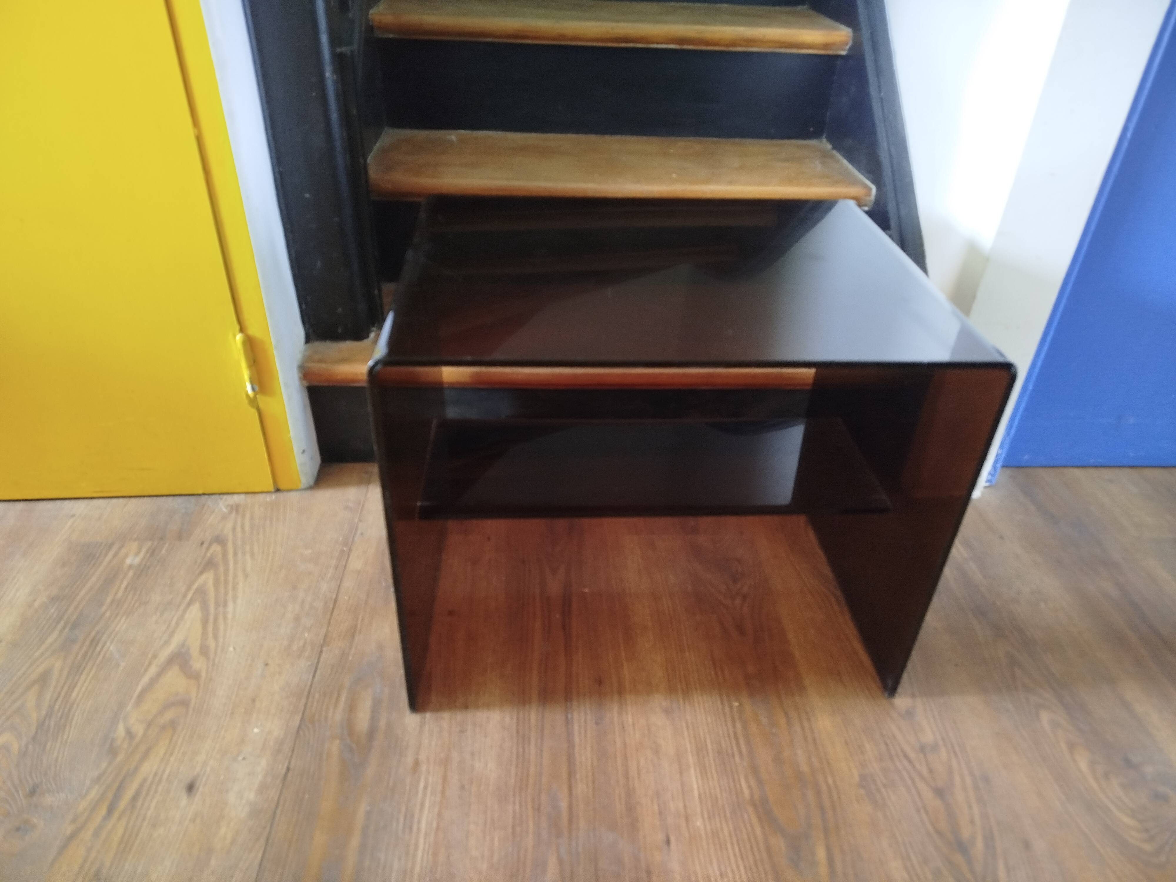 Coffee table / accent piece by Michel Dumas in smoked plexiglass – year