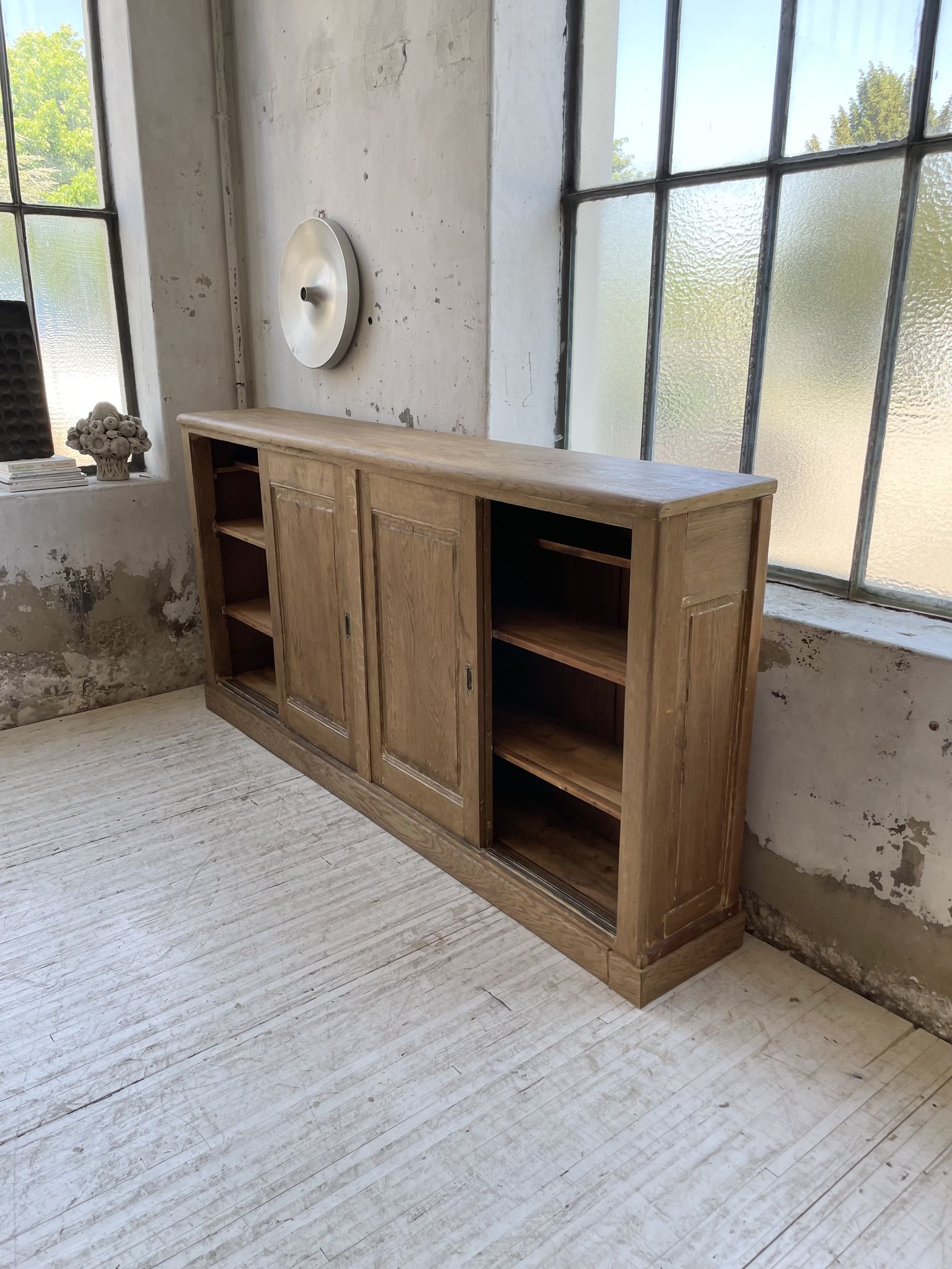 Large row of solid oak loom sliding doors