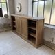 Large row of solid oak loom sliding doors