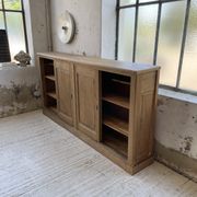 Large row of solid oak loom sliding doors