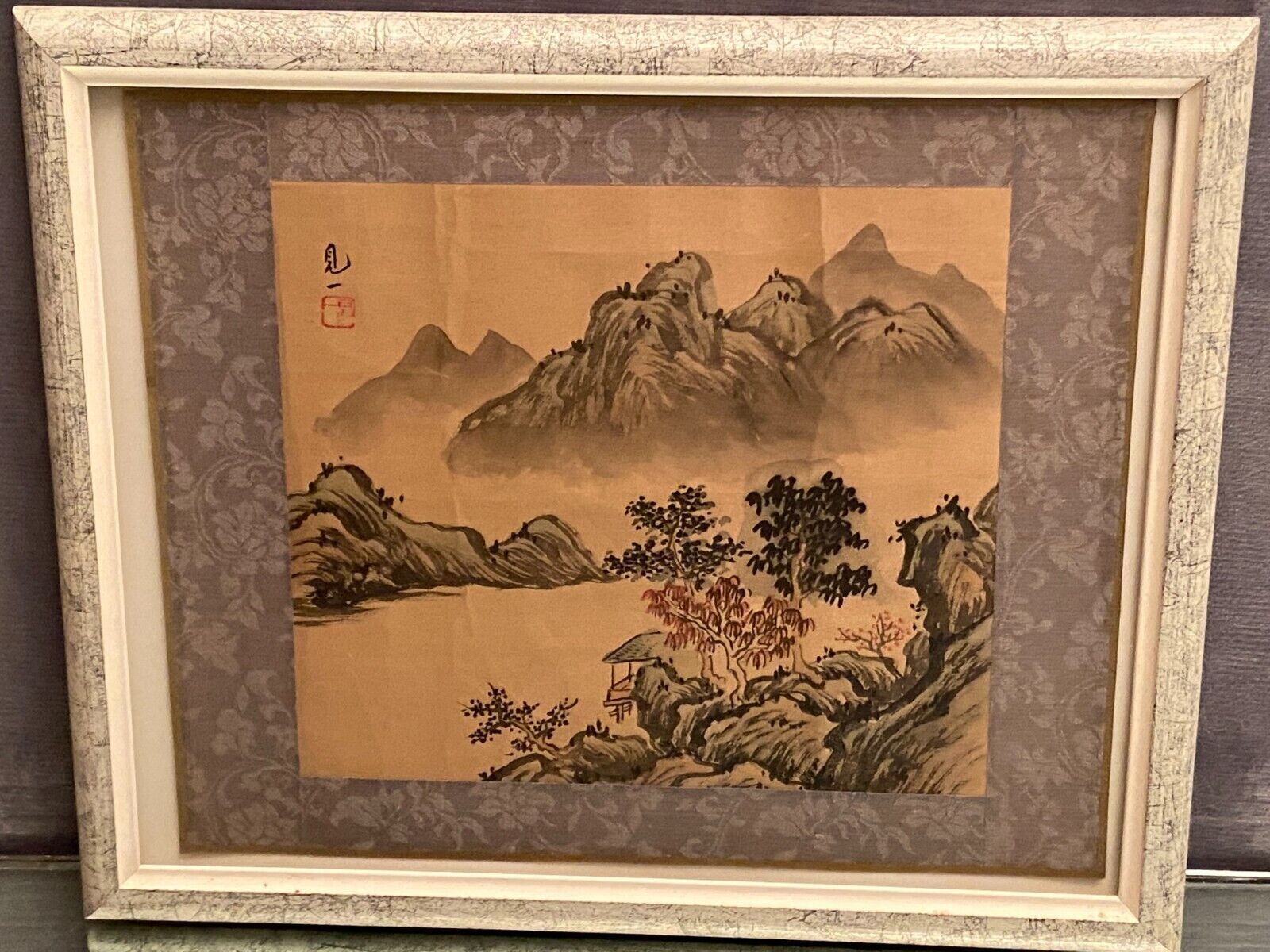 India ink drawing with red markings depicting a mountain landscape