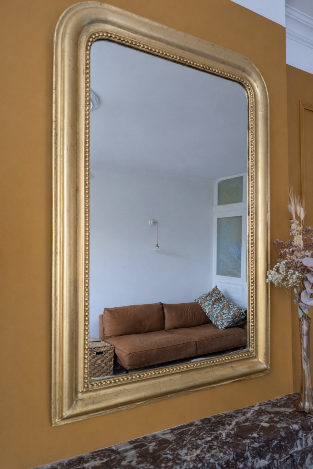 Large antique gilded mirror.