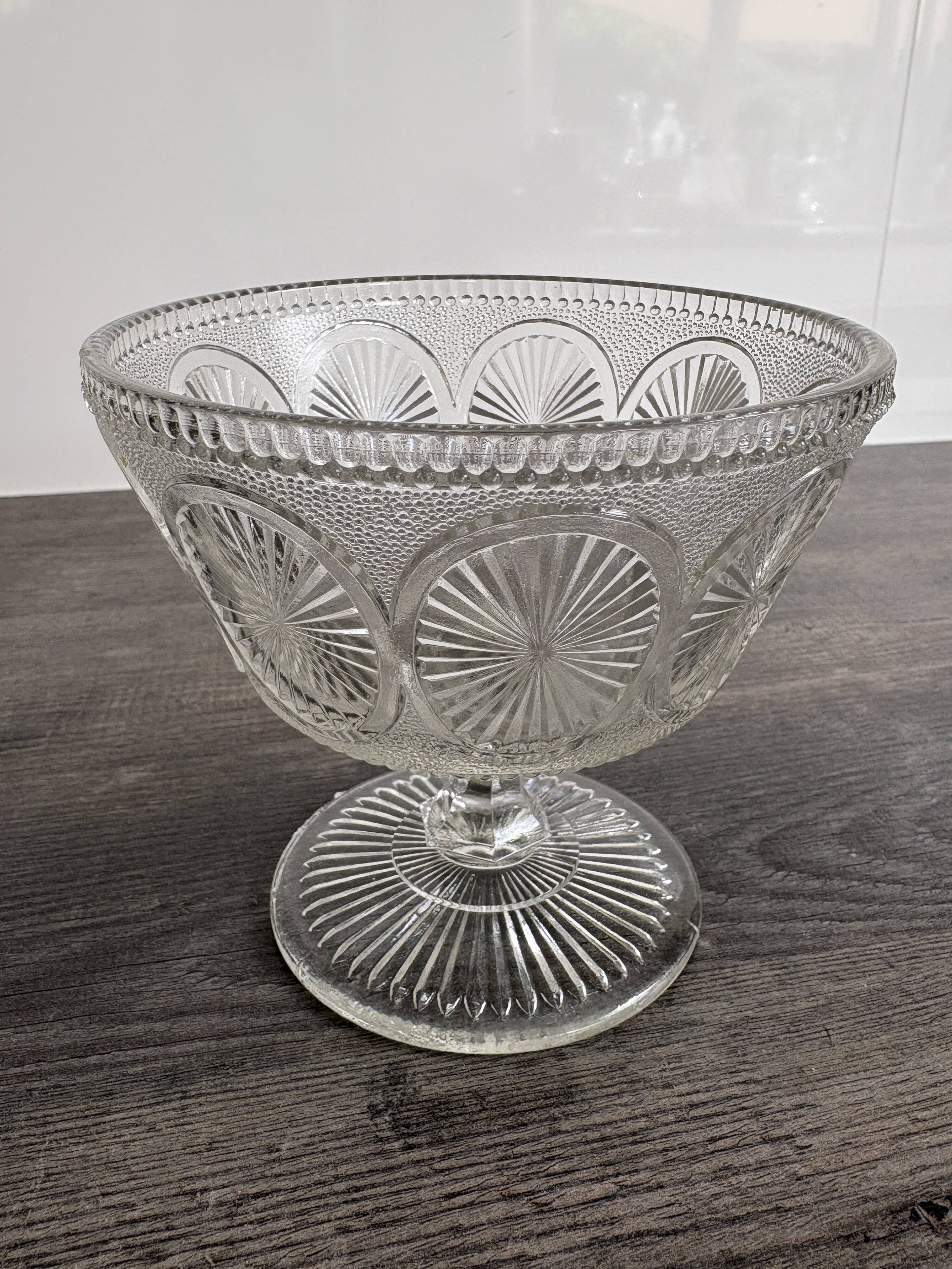 Antique glass bowl on pedestal