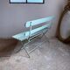 Former folding garden bench with wooden and metal slats