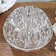 Set of three vintage flowers in transparent molded glass