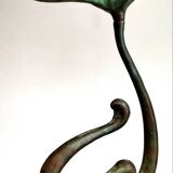 Set of four organically shaped bronze candlesticks in Art Nouveau style