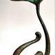 Ensemble de quatre bougeoirs en bronze de forme organique de style Art Nouveau