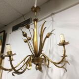 Golden chandelier of the 70s joncs decorations