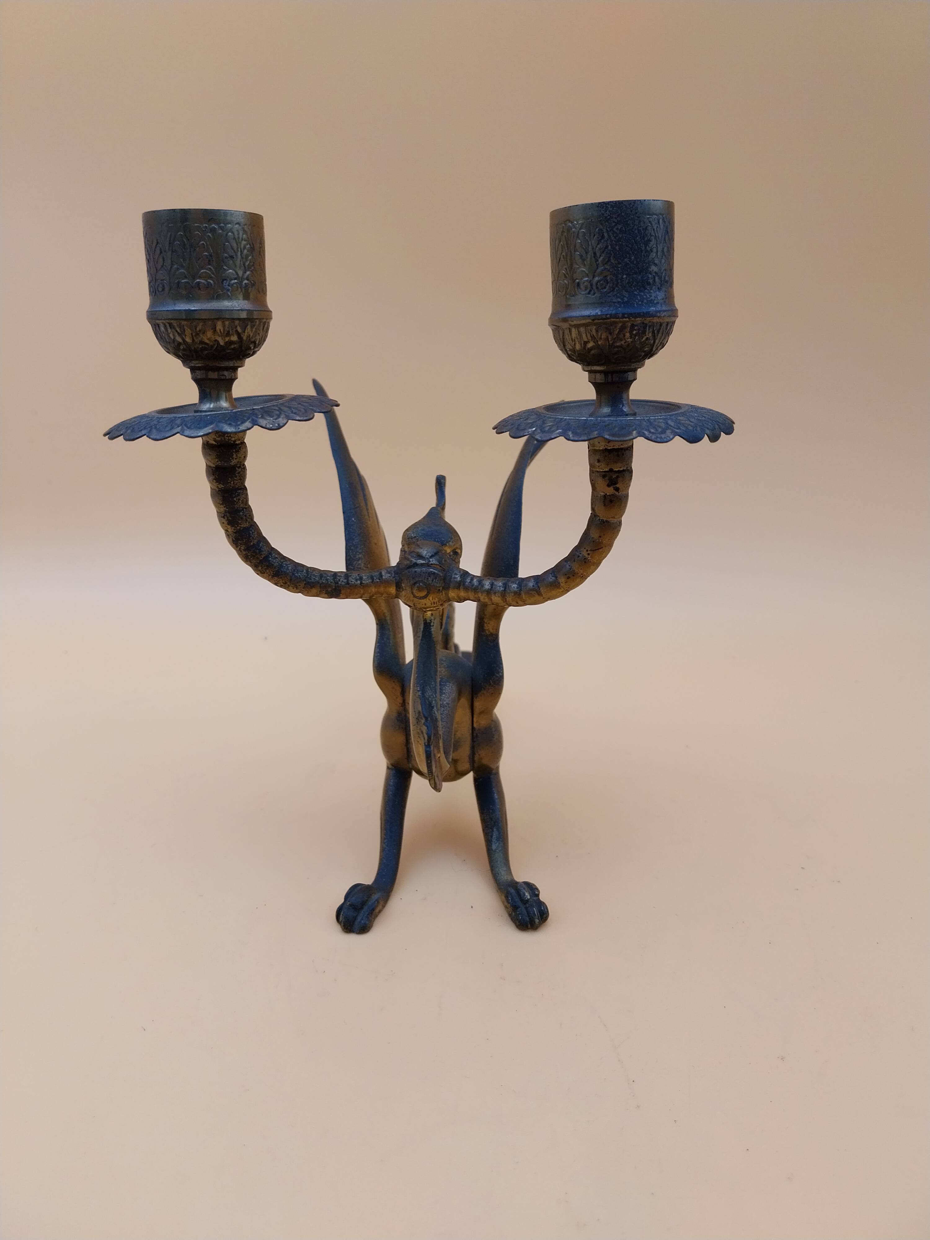 Pair of bronze candlesticks with chimera dragons
