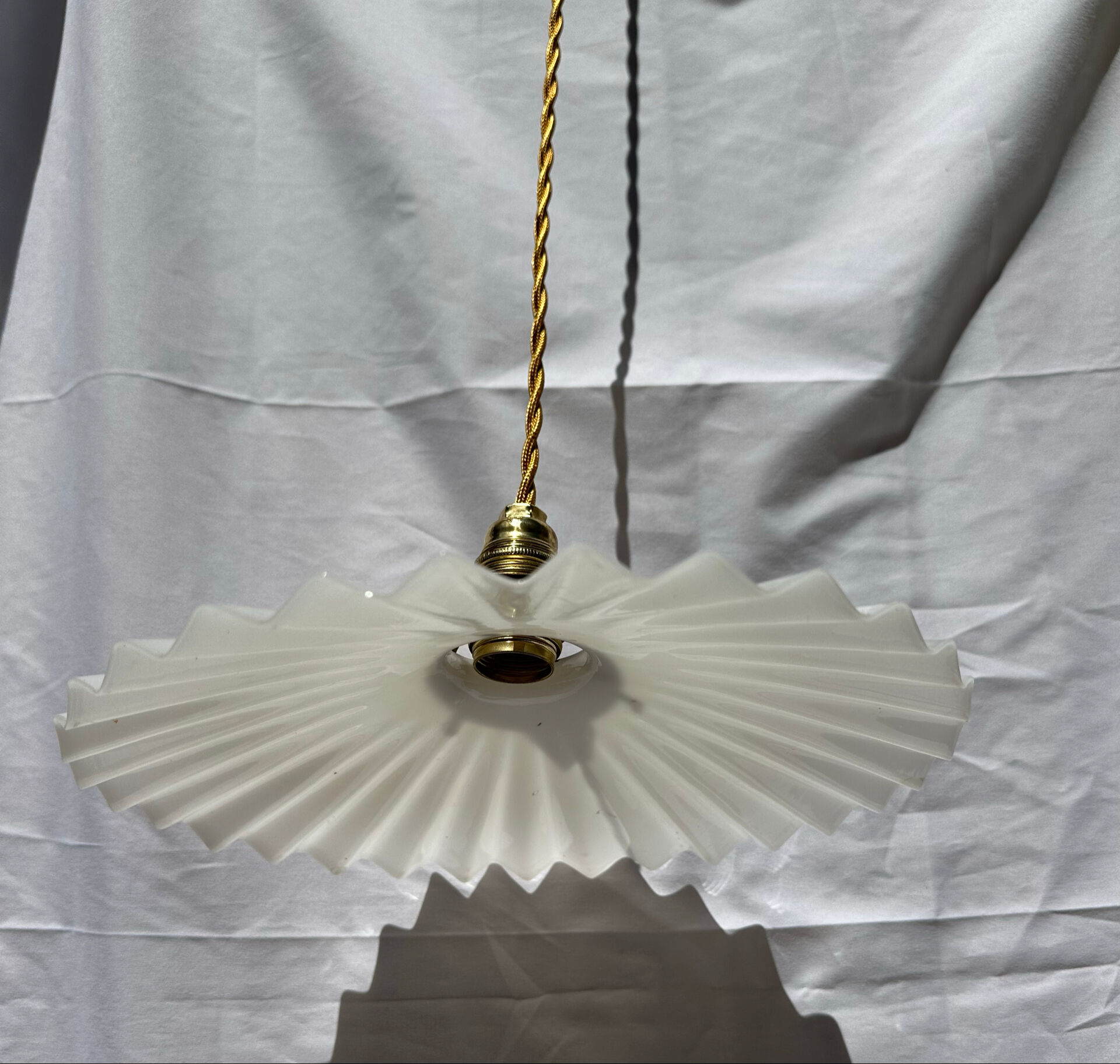 Vintage suspension opaline pleated lampshade with golden threads and claw socket.