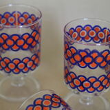 Blue and orange patterned foot glasses set