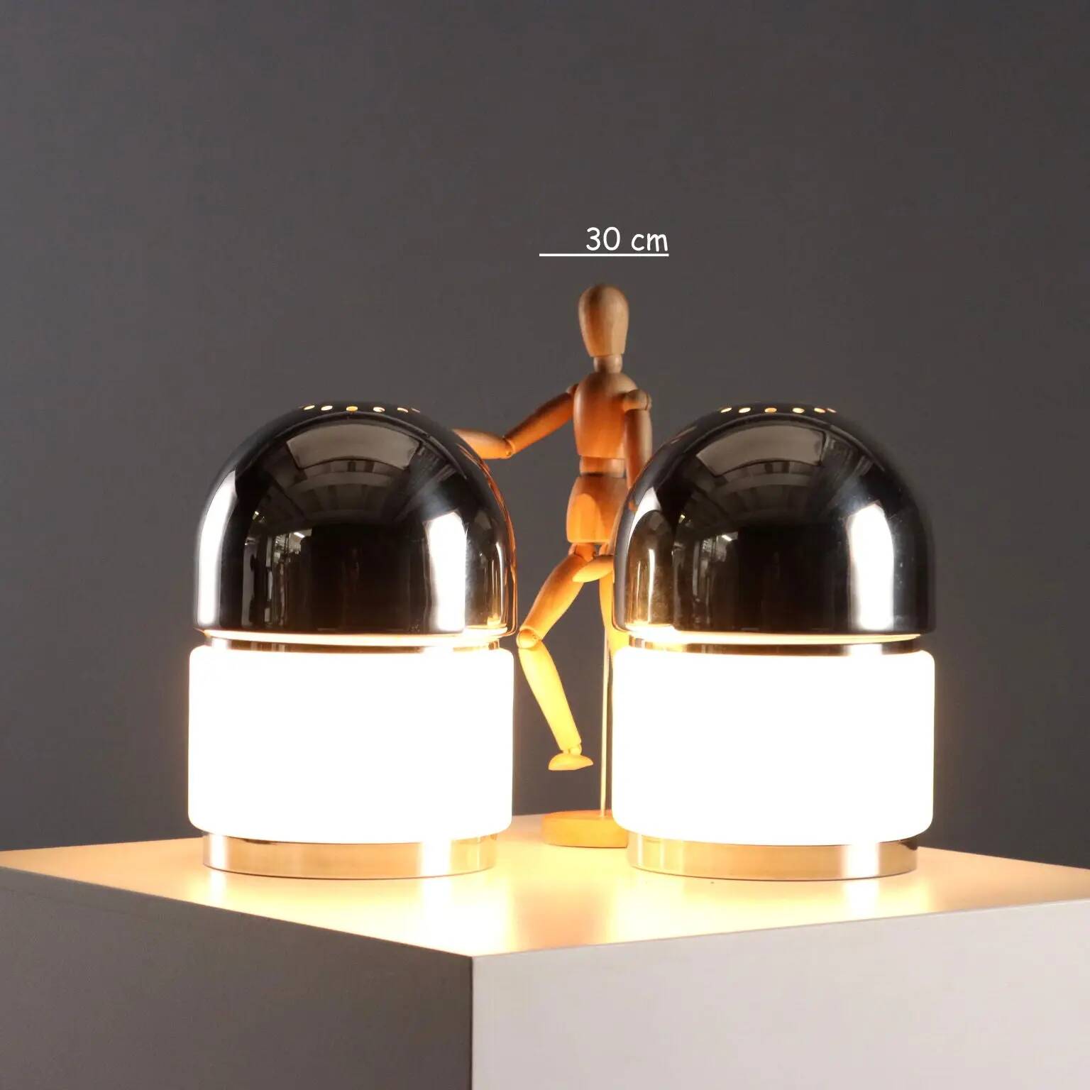 Pair of vintage Reggiani "Salt and Pepper" metal table lamps, 1960s design.