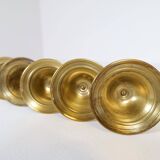 Mid-century set of 5 brass candlesticks by Lars Holmström, Arvika, Sweden.