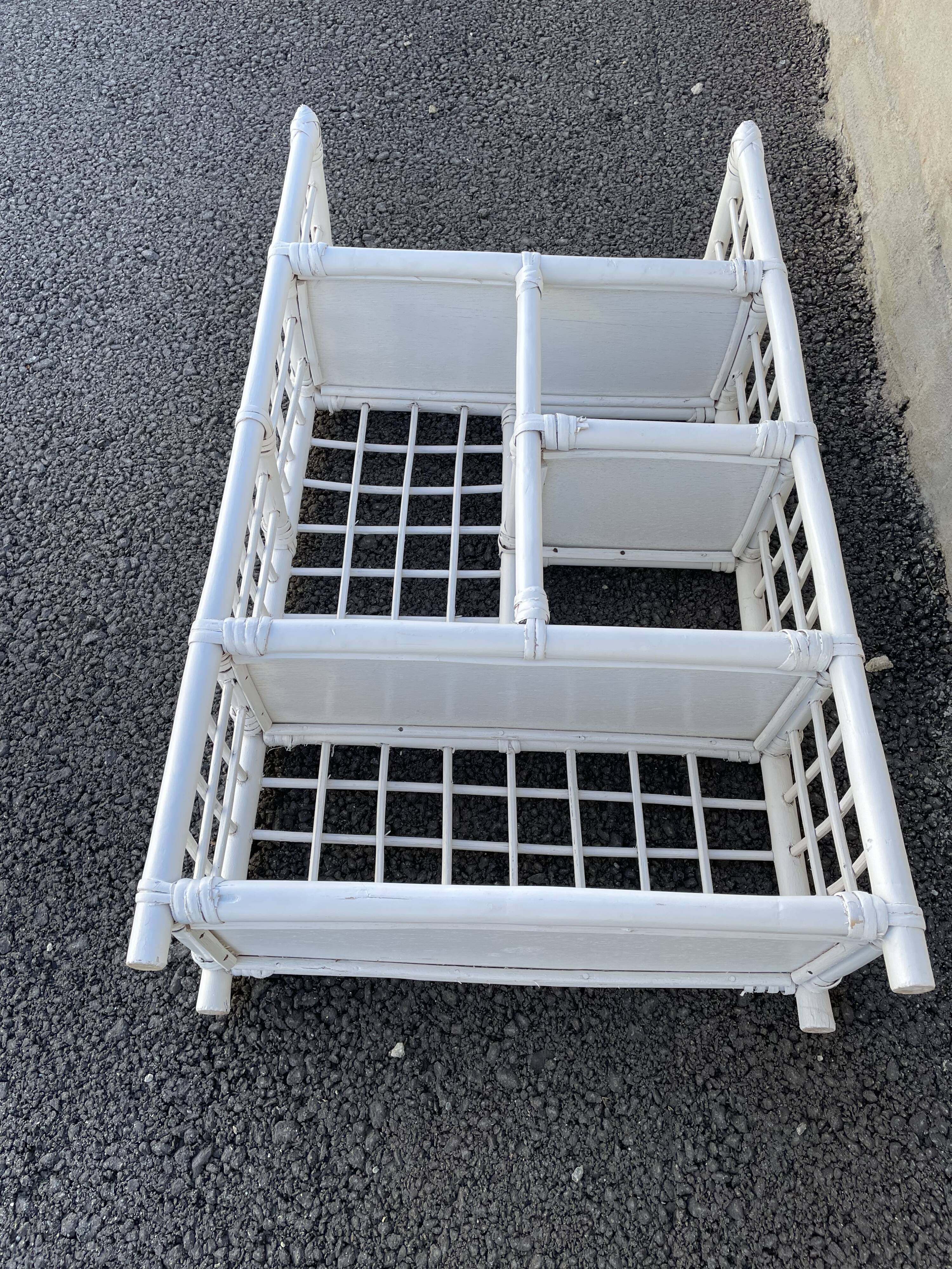 White rattan shelf with braces