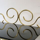 Bedside table in gold metal and black glass