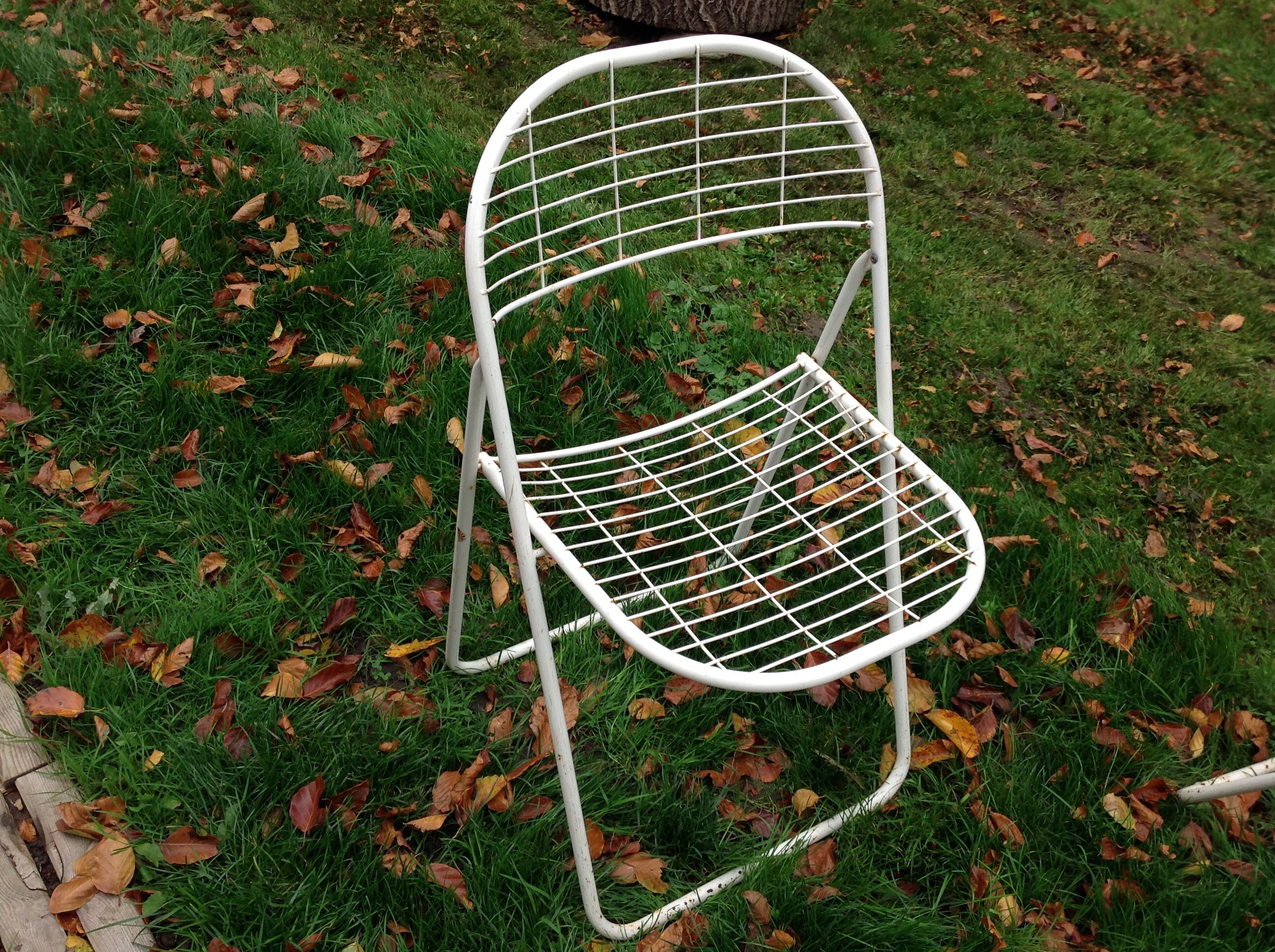 Trio of folding metal chairs