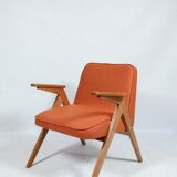 Fauteuil scandinave orange brûlée conclu par Chierowski