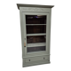Glass display cabinet with drawer