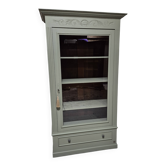 Glass display cabinet with drawer