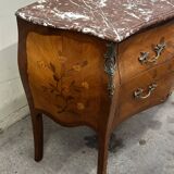 Curved and inlaid Louis XV style chest of drawers