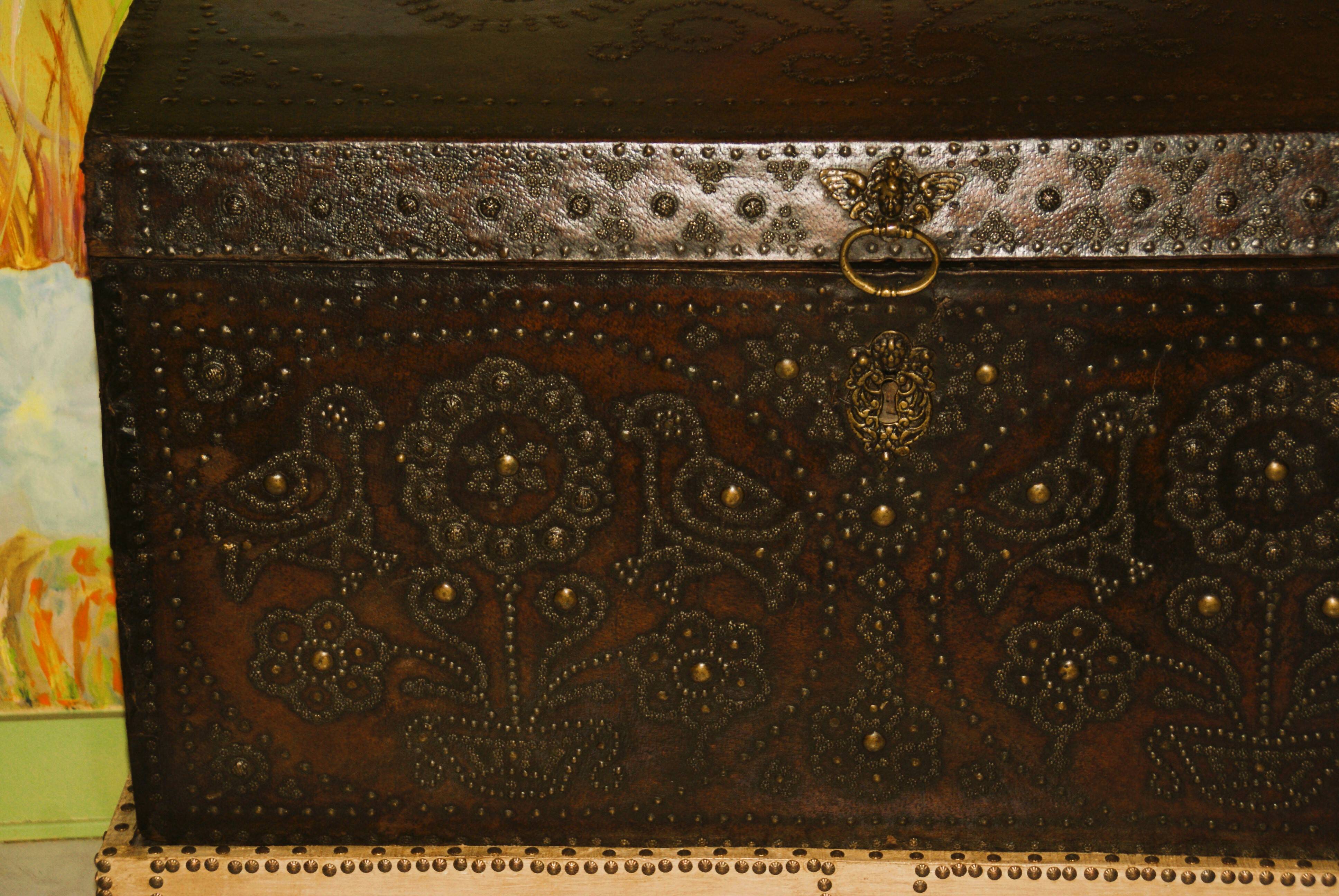 17th century studded leather travel trunk, richly decorated