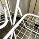 2 white metal "Ted Ned" folding chairs by Niels Gammelgaard for IKEA, 1980s