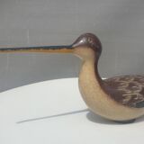 Carved painted wooden curlew
