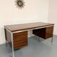 Vintage desk with rosewood veneer and chrome metal design from the 1970s.