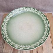 Antique compote stand Lunéville St Clément with green clover decoration.