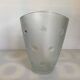 Vase with polka dots, Italy, round with relief.