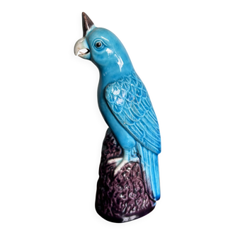 Porcelain parrot statuette