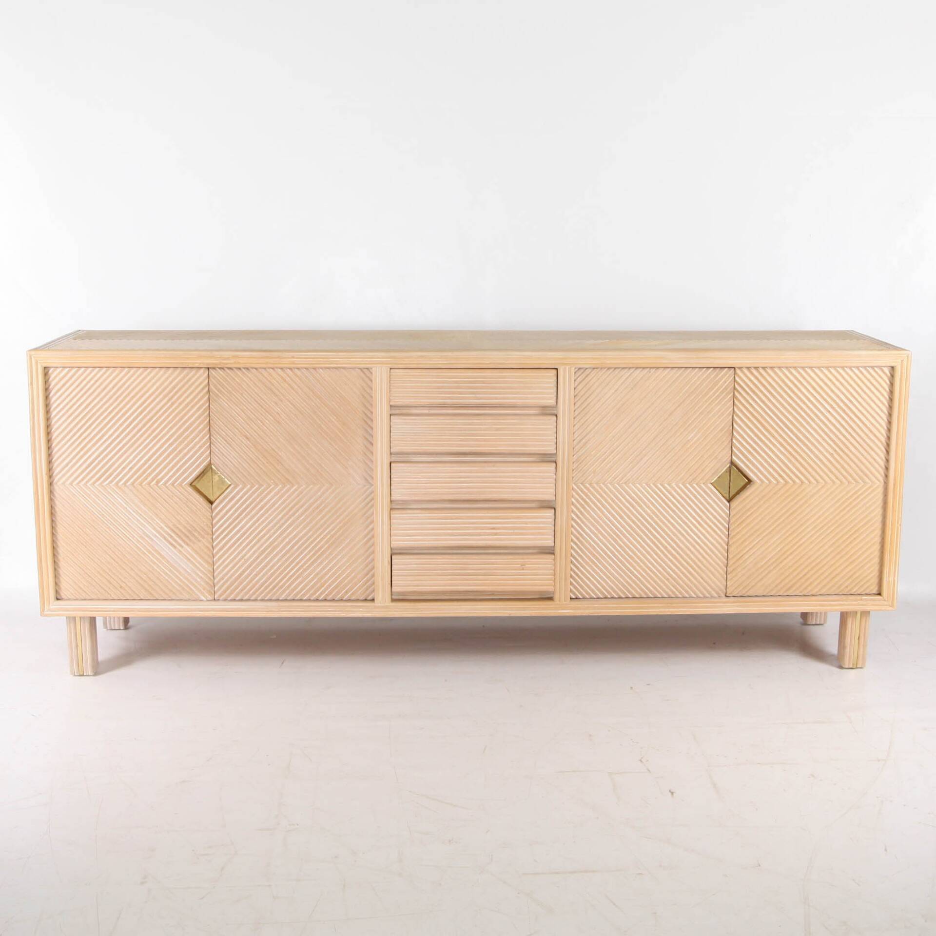 Rattan and brass sideboard