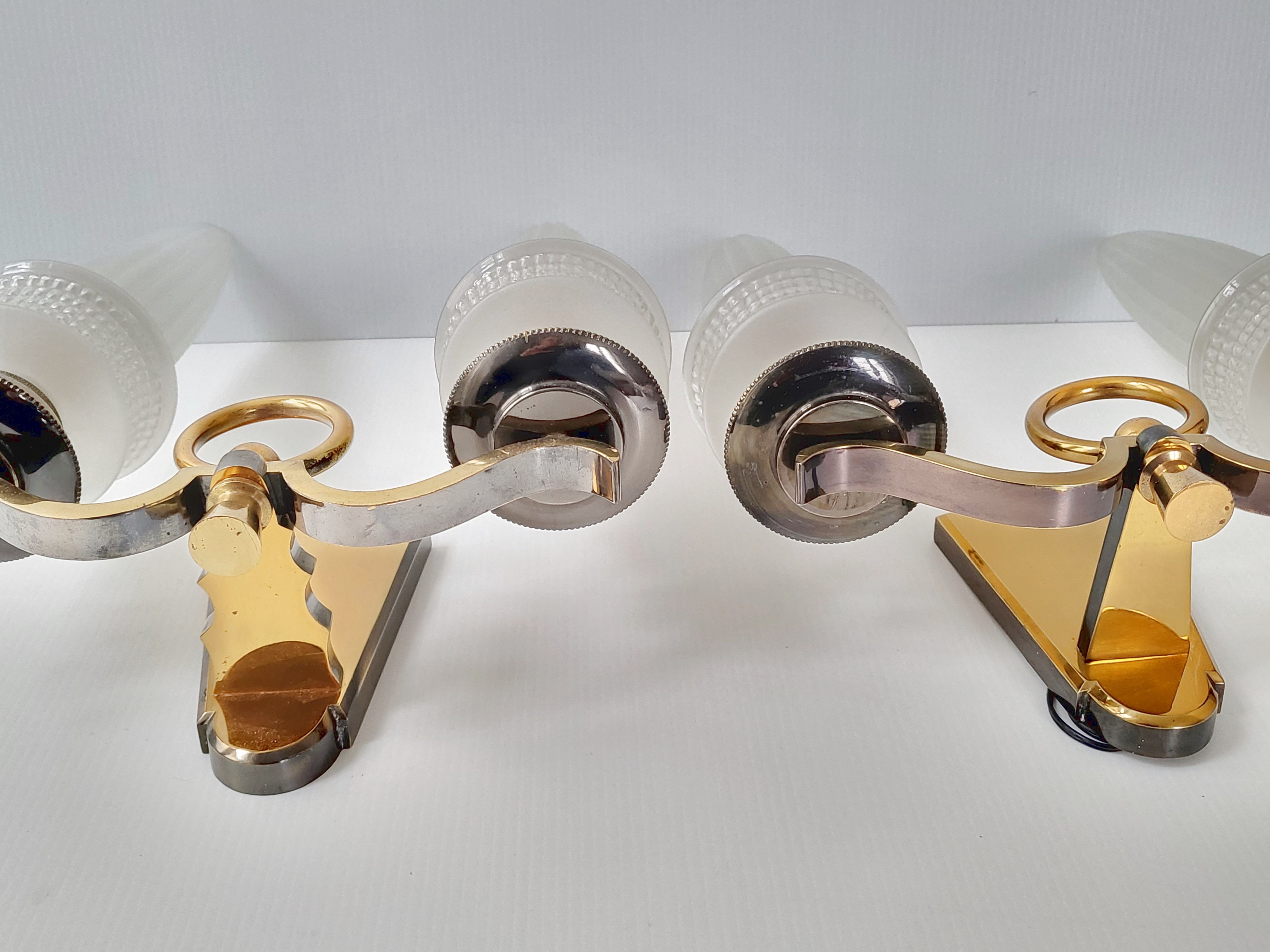 Pair of vintage bronze wall lamps house Libéros 1950