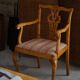 A pair of English Chippendale style armchairs in birch, 20th century, England.