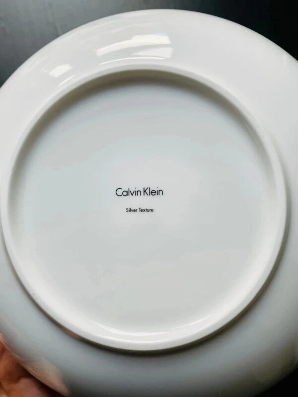 4 Calvin Klein salad plates