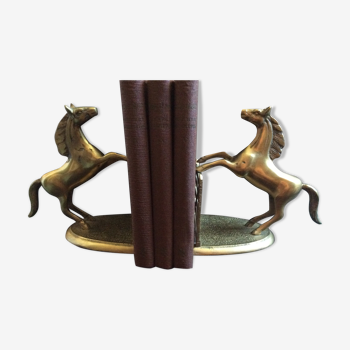 Greenhouse brass books horses